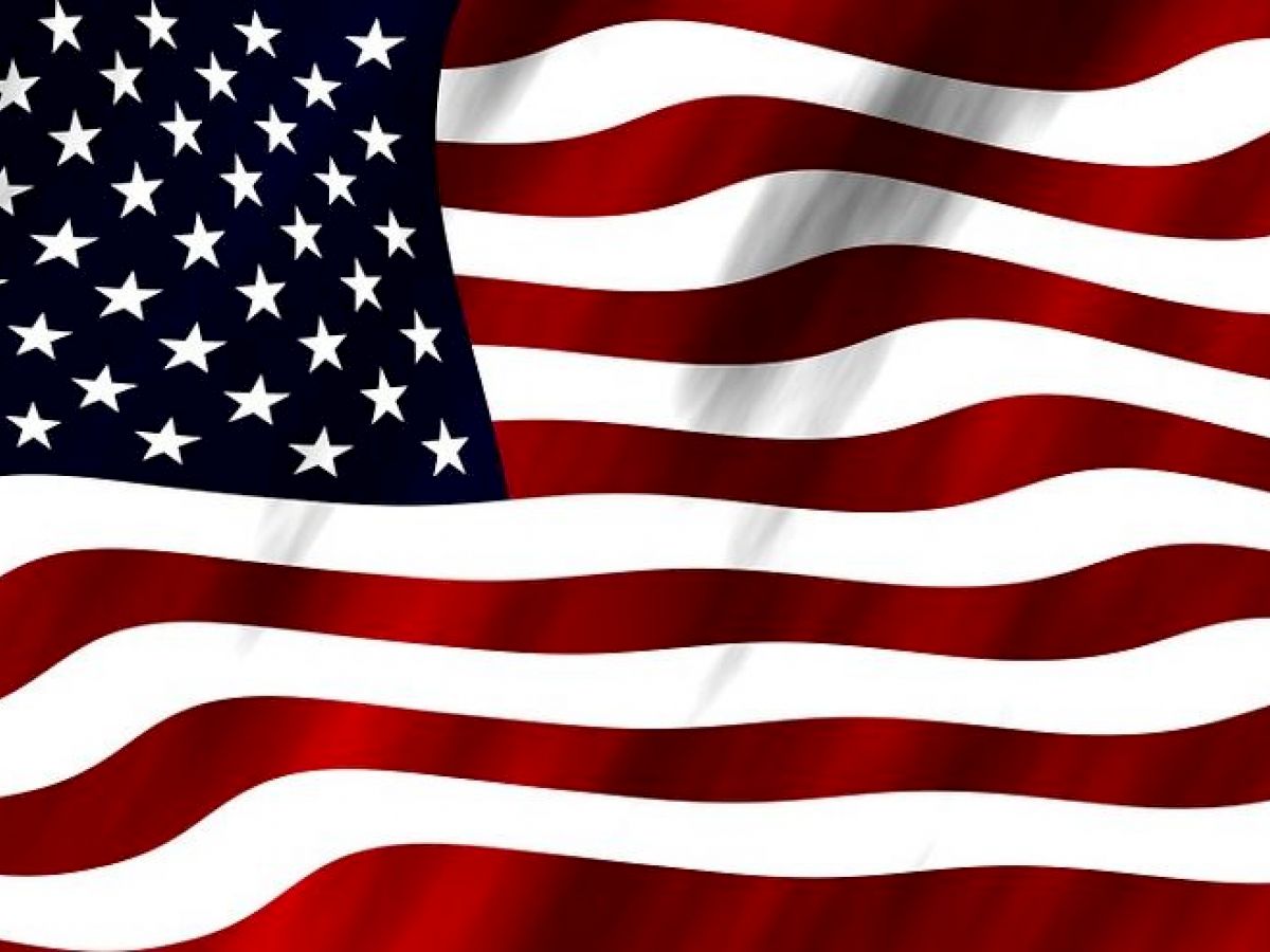 This image displays the flag of the United States featuring 50 white stars on a blue field and 13 red and white stripes.